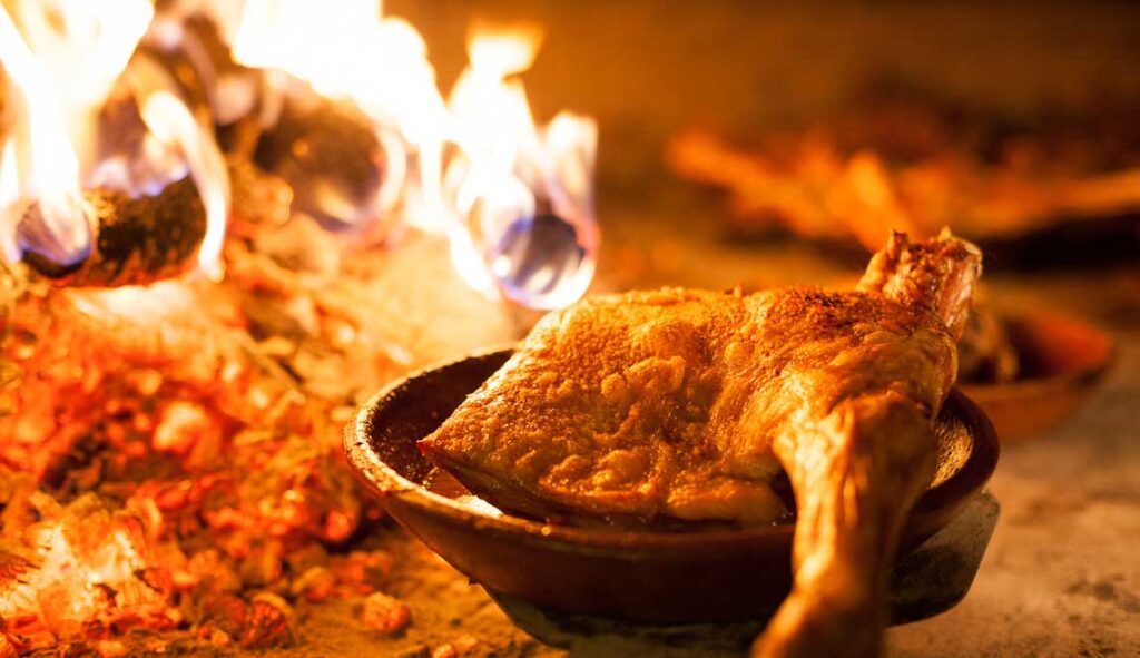 LECHAZO CHURRO ASADO EN HORNO DE LEÑA